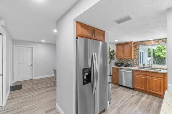 Interior, Kitchen, Recessed Lighting, Stainless Steel Appliances, Wood Texture Flooring