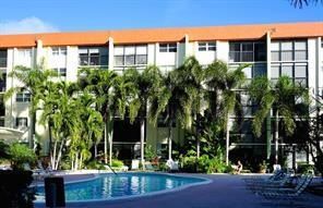 Exterior, Facade, Pool, Condo Building