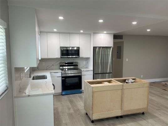 Interior, Kitchen, Recessed Lighting, Stainless Steel Appliances, Wood Texture Flooring