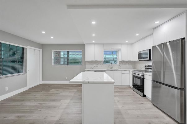 Interior, Kitchen, Recessed Lighting, Stainless Steel Appliances, Wood Texture Flooring