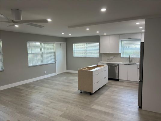 Interior, Kitchen, Marble Walls, Recessed Lighting, Wood Texture Flooring