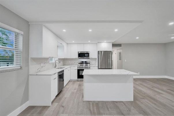 Interior, Kitchen, Recessed Lighting, Stainless Steel Appliances, Wood Texture Flooring