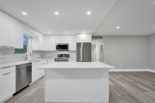 Interior, Kitchen, Recessed Lighting, Stainless Steel Appliances, Wood Texture Flooring