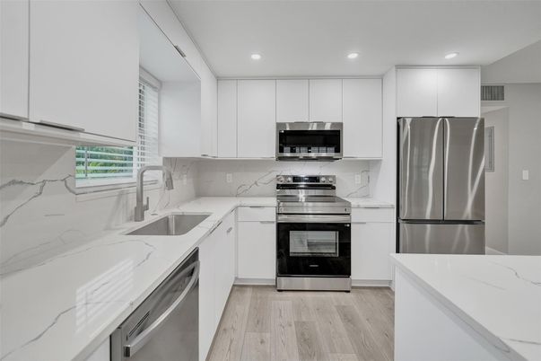 Interior, Kitchen, Recessed Lighting, Stainless Steel Appliances, Wood Texture Flooring