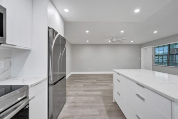 Interior, Kitchen, Recessed Lighting, Stainless Steel Appliances, Wood Texture Flooring