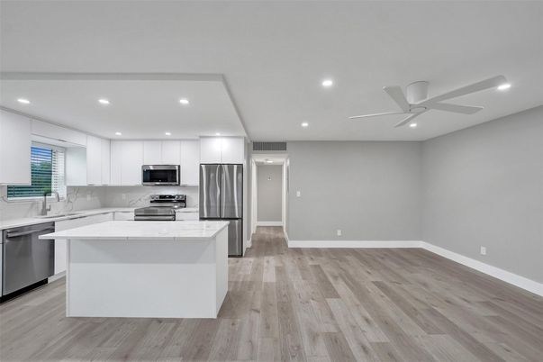 Interior, Kitchen, Recessed Lighting, Stainless Steel Appliances, Wood Texture Flooring