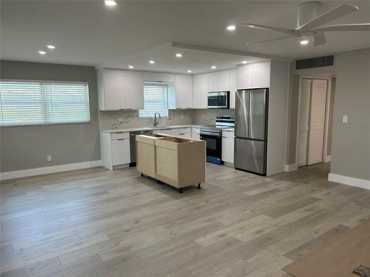 Interior, Kitchen, Recessed Lighting, Stainless Steel Appliances, Wood Texture Flooring