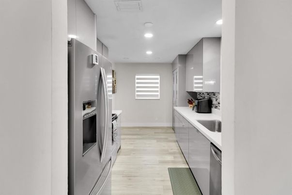 Interior, Kitchen, Recessed Lighting, Stainless Steel Appliances, Wood Texture Flooring