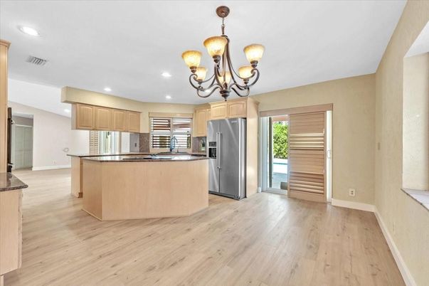Chandelier, Interior, Kitchen, Recessed Lighting, Stainless Steel Appliances, Wood Texture Flooring