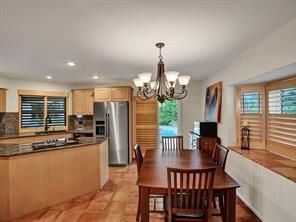 Chandelier, Dining room, Interior, Kitchen, Recessed Lighting, Stainless Steel Appliances, Wood Texture Flooring