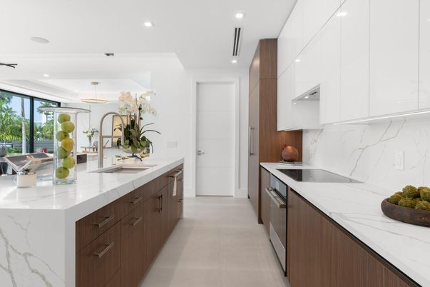 Interior, Kitchen, Marble Walls, Pendant Lights, Recessed Lighting, Stainless Steel Appliances