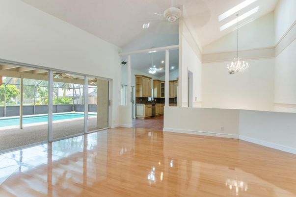 Chandelier, Empty room, Interior, Recessed Lighting, Wood Texture Flooring