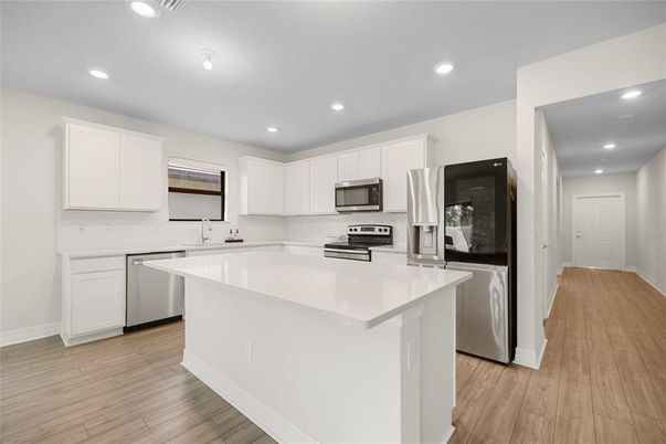 Interior, Kitchen, Recessed Lighting, Stainless Steel Appliances, Wood Texture Flooring