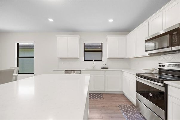 Interior, Kitchen, Recessed Lighting, Stainless Steel Appliances, Wood Texture Flooring