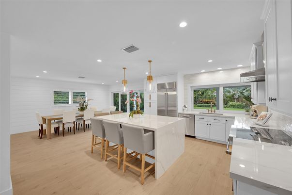 Dining room, Interior, Kitchen, Pendant Lights, Recessed Lighting, Stainless Steel Appliances, Wood Texture Flooring