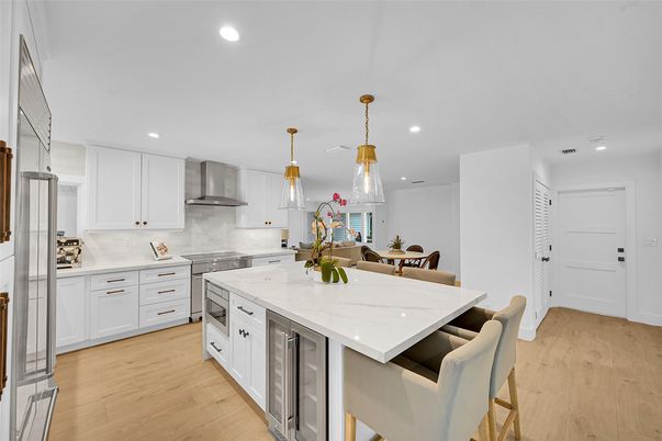Dining room, Interior, Kitchen, Pendant Lights, Recessed Lighting, Stainless Steel Appliances, Wood Texture Flooring