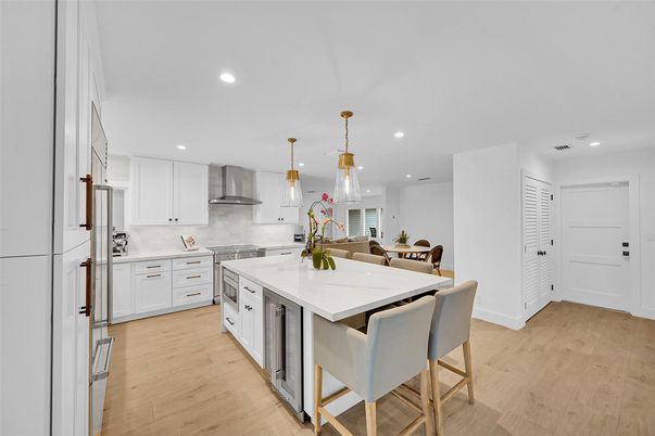 Dining room, Interior, Kitchen, Pendant Lights, Recessed Lighting, Stainless Steel Appliances, Wood Texture Flooring