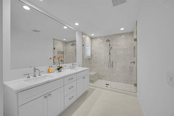 Bathroom, Dual Sink Vanities, Glass Shower, Interior, Marble Walls, Recessed Lighting