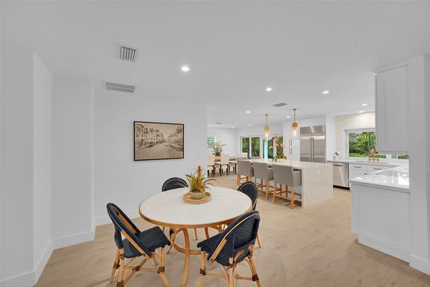 Dining room, Interior, Kitchen, Pendant Lights, Recessed Lighting, Stainless Steel Appliances, Wood Texture Flooring