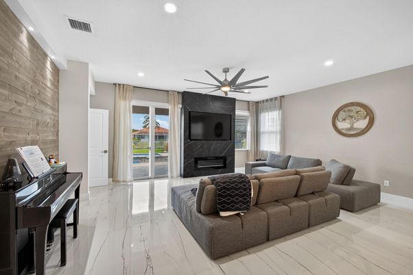 Fireplace, Interior, Living room, Marble, Piano, Recessed Lighting, Wooden Walls
