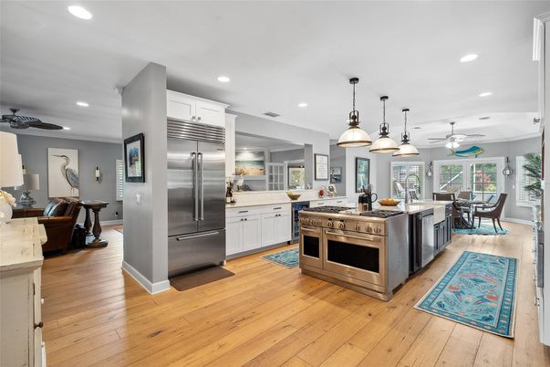 Dining room, Interior, Kitchen, Living room, Pendant Lights, Recessed Lighting, Stainless Steel Appliances, Wood Texture Flooring