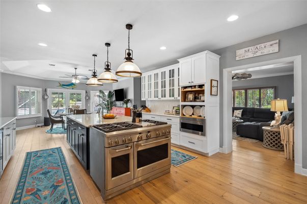 Dining room, Interior, Kitchen, Living room, Pendant Lights, Recessed Lighting, Stainless Steel Appliances, Wood Texture Flooring