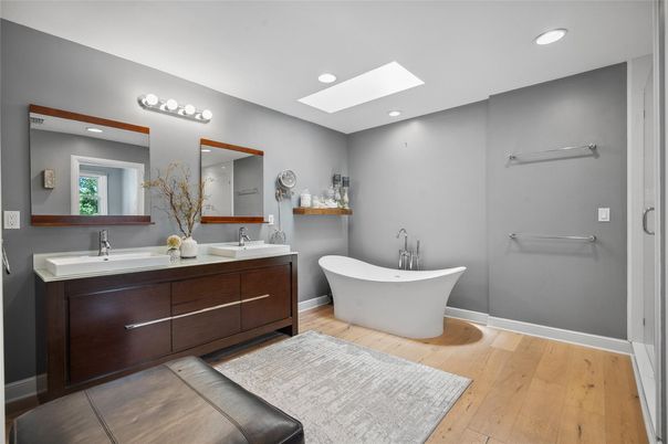 Bathroom, Dual Sink Vanities, Free Standing Baths, Interior, Recessed Lighting, Wood Texture Flooring