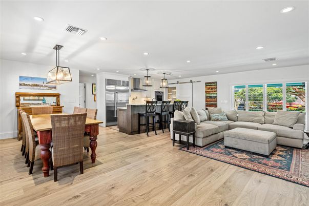 Dining room, Interior, Kitchen, Living room, Pendant Lights, Recessed Lighting, Stainless Steel Appliances, Wood Texture Flooring