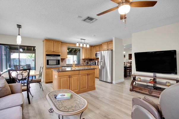 Dining room, Interior, Kitchen, Pendant Lights, Stainless Steel Appliances, Wood Texture Flooring