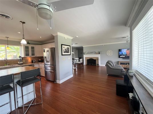 Fireplace, Interior, Kitchen, Pendant Lights, Recessed Lighting, Stainless Steel Appliances, Wood Texture Flooring
