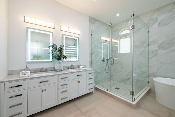 Bathroom, Dual Sink Vanities, Free Standing Baths, Glass Shower, Interior, Marble Walls, Recessed Lighting