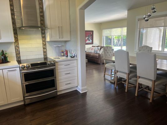 Dining room, Interior, Kitchen, Pendant Lights, Recessed Lighting, Stainless Steel Appliances, Wood Texture Flooring