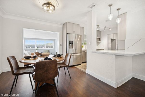 Dining room, Interior, Kitchen, Pendant Lights, Stainless Steel Appliances, Wood Texture Flooring