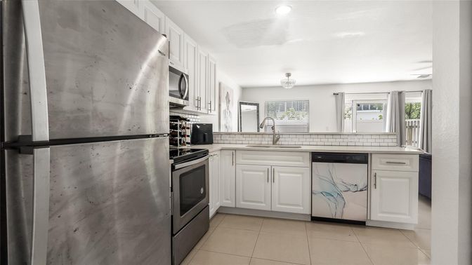 Interior, Kitchen, Recessed Lighting, Tile Countertops