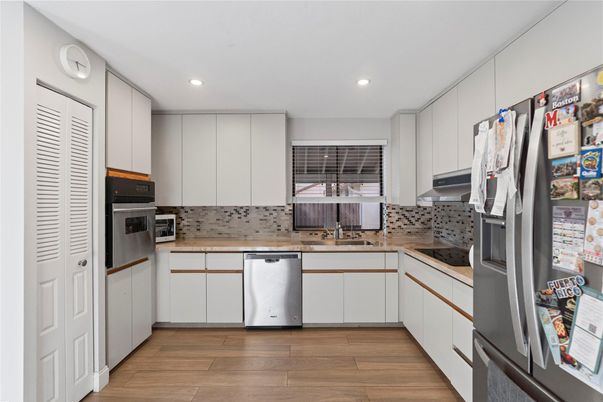 Interior, Kitchen, Recessed Lighting, Stainless Steel Appliances, Wood Texture Flooring