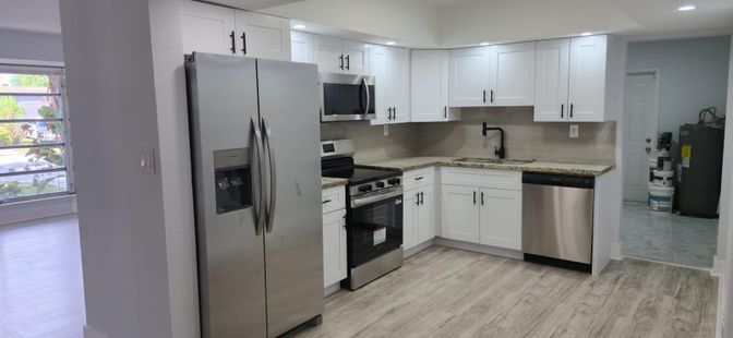 Interior, Kitchen, Recessed Lighting, Stainless Steel Appliances, Wood Texture Flooring