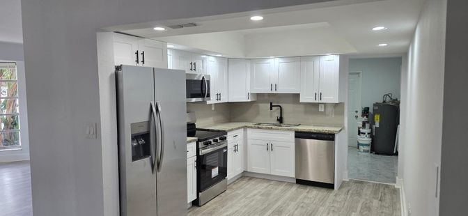 Interior, Kitchen, Recessed Lighting, Stainless Steel Appliances, Wood Texture Flooring