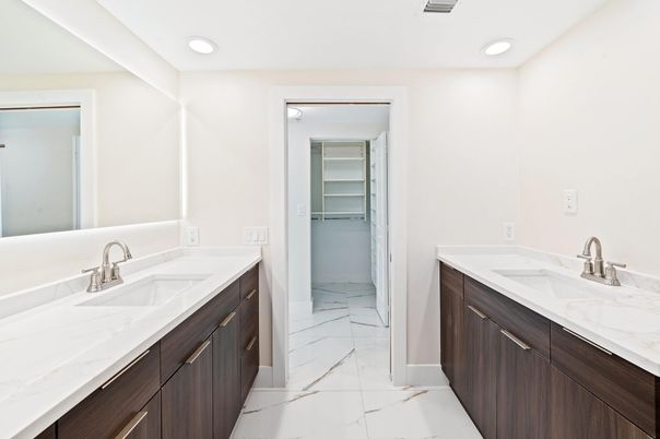 Bathroom, Dual Sink Vanities, Interior, Marble, Recessed Lighting, Walk-in Closets