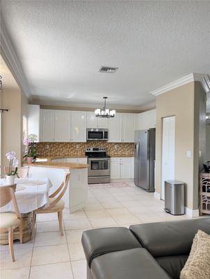 Chandelier, Dining room, Interior, Kitchen, Stainless Steel Appliances