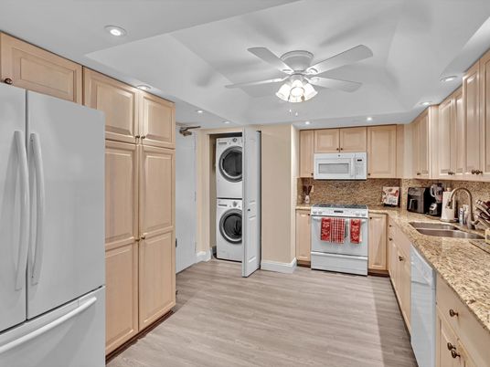Interior, Kitchen, Recessed Lighting, Washer, Wood Texture Flooring
