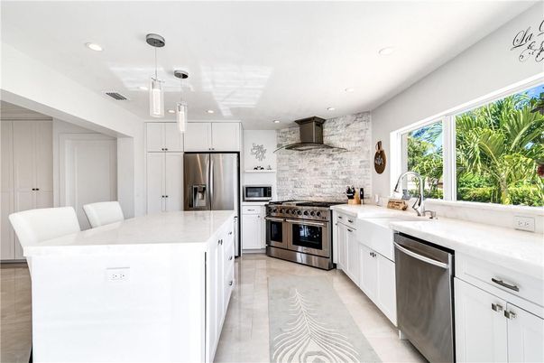Interior, Kitchen, Pendant Lights, Recessed Lighting, Stainless Steel Appliances, Stone Walls