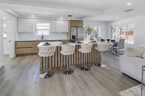 Dining room, Interior, Kitchen, Recessed Lighting, Stainless Steel Appliances, Wood Texture Flooring