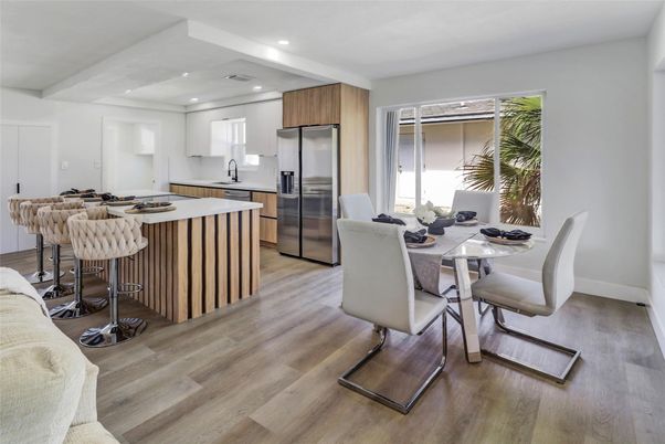 Dining room, Interior, Kitchen, Recessed Lighting, Stainless Steel Appliances, Wood Texture Flooring