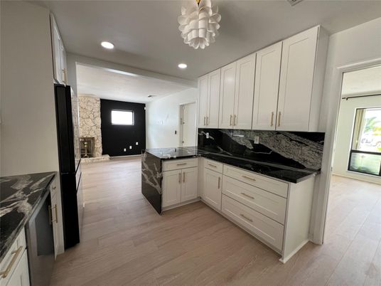 Chandelier, Fireplace, Interior, Kitchen, Recessed Lighting, Wood Texture Flooring
