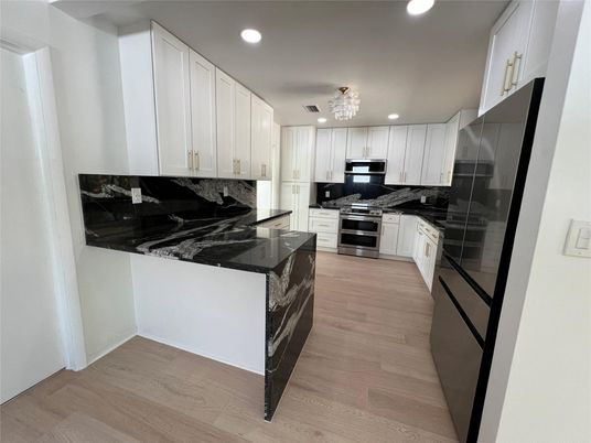 Interior, Kitchen, Recessed Lighting, Stainless Steel Appliances, Wood Texture Flooring
