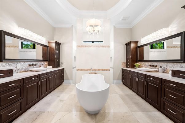 Bathroom, Chandelier, Dual Sink Vanities, Free Standing Baths, Interior, Marble, Pendant Lights
