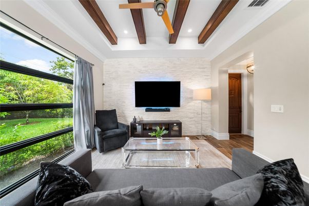 Fireplace, Interior, Living room, Recessed Lighting, Stone Walls, Wooden Beams, Wood Texture Flooring