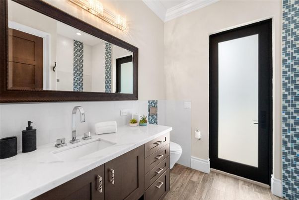Bathroom, Dual Sink Vanities, Interior, Recessed Lighting, Wood Texture Flooring