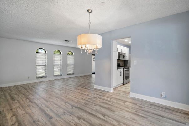 Chandelier, Empty room, Interior, Kitchen, Recessed Lighting, Wood Texture Flooring