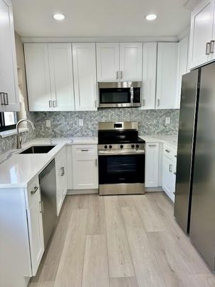 Interior, Kitchen, Recessed Lighting, Stainless Steel Appliances, Wood Texture Flooring